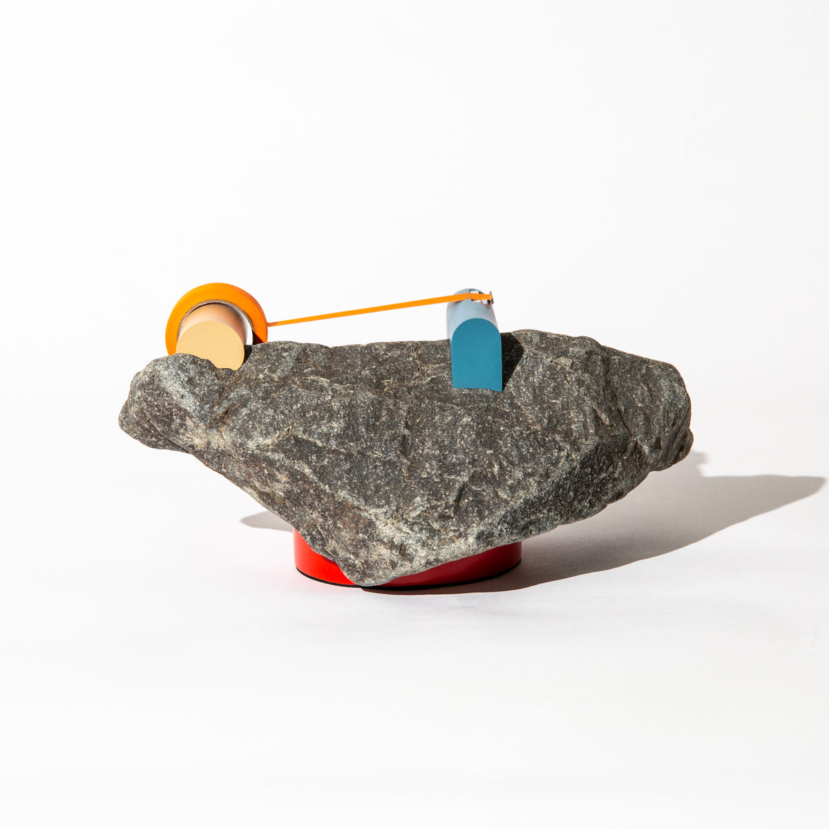 Tape dispenser on Stone with a triangular cross-section / No